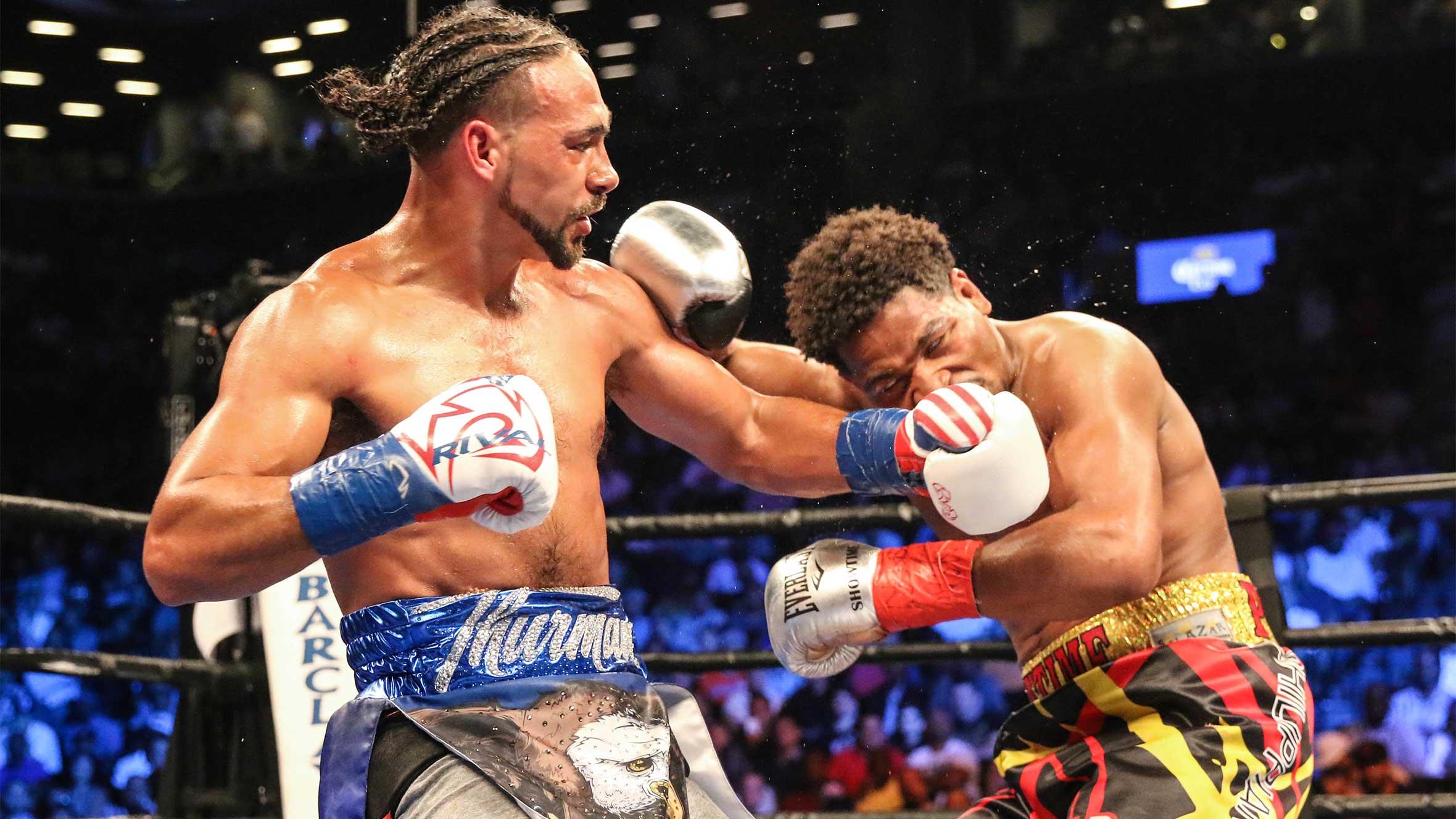 Thurman outlasts Porter, holds on to 147-pound title in fist