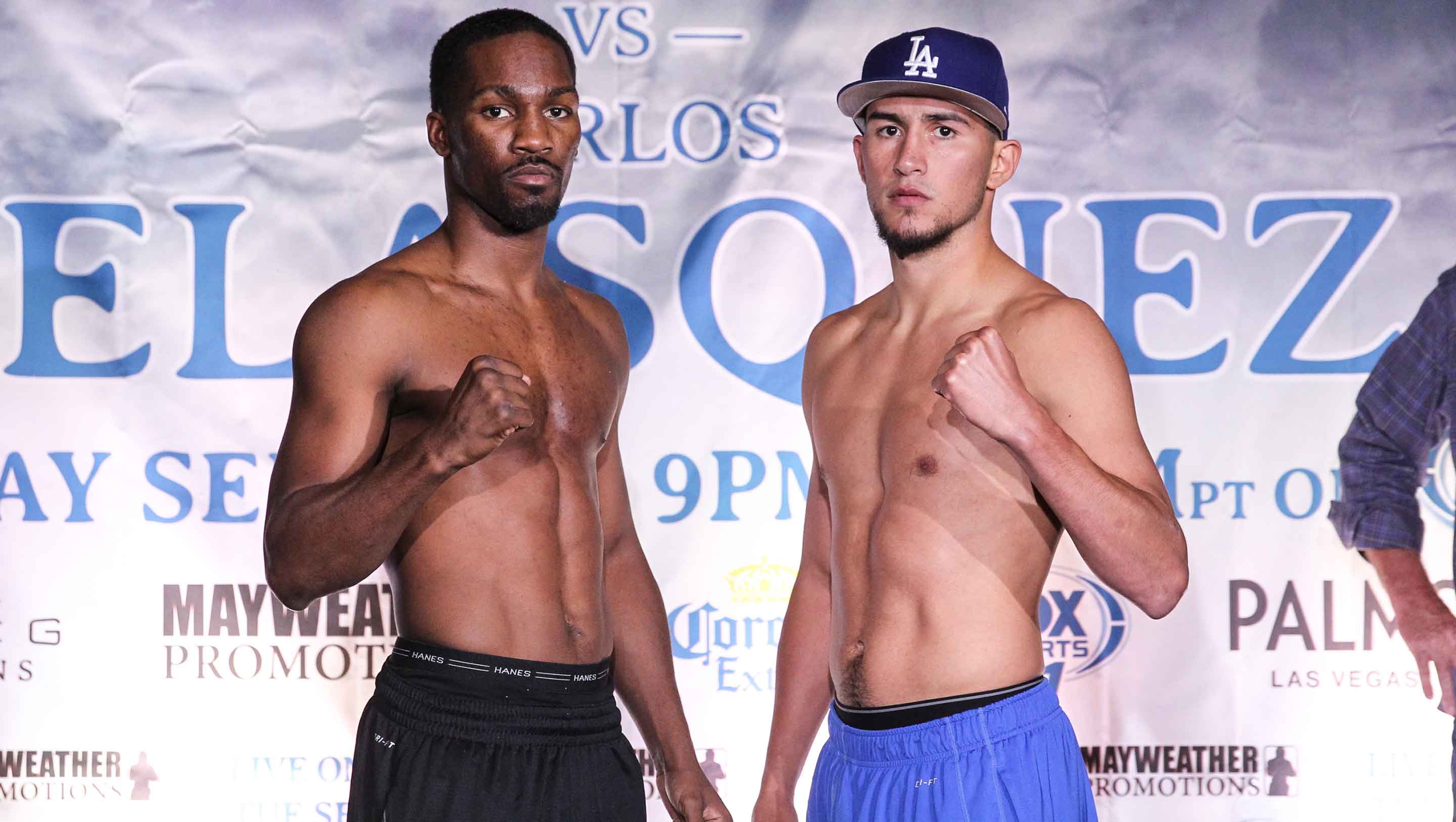 Fists forward at the weigh-in