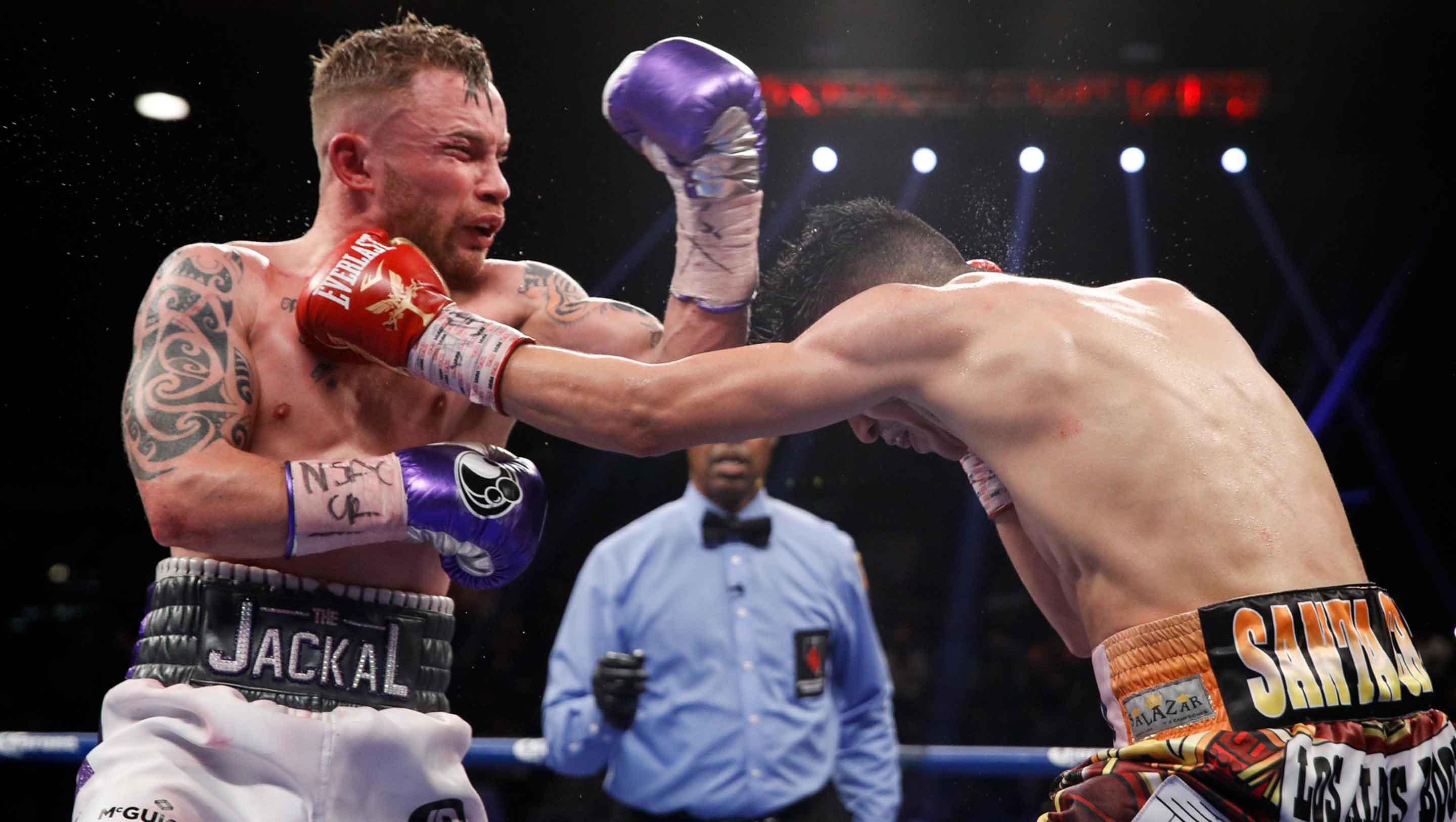 The champions exchange punches