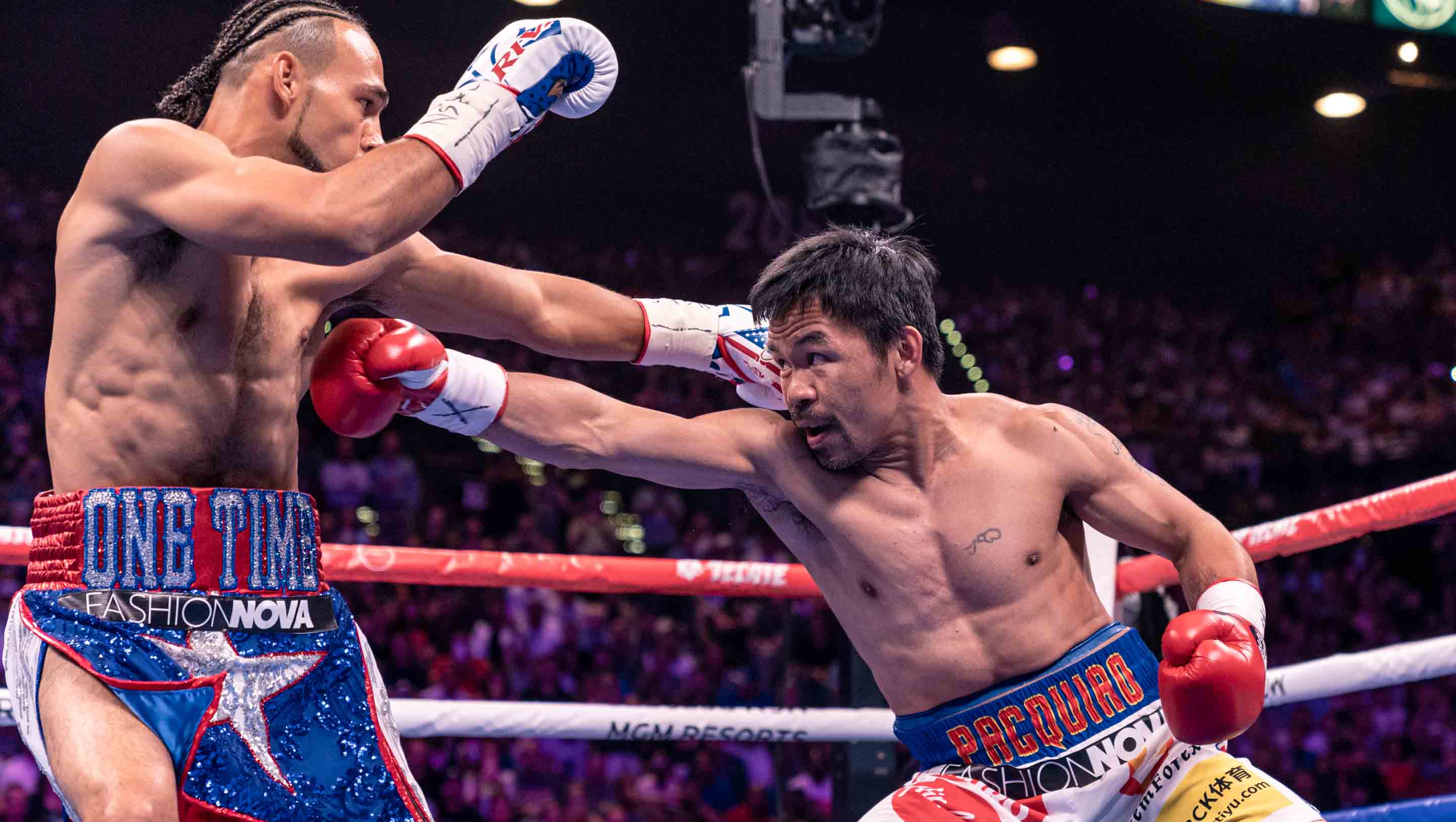 Pacquiao throws a right to the body