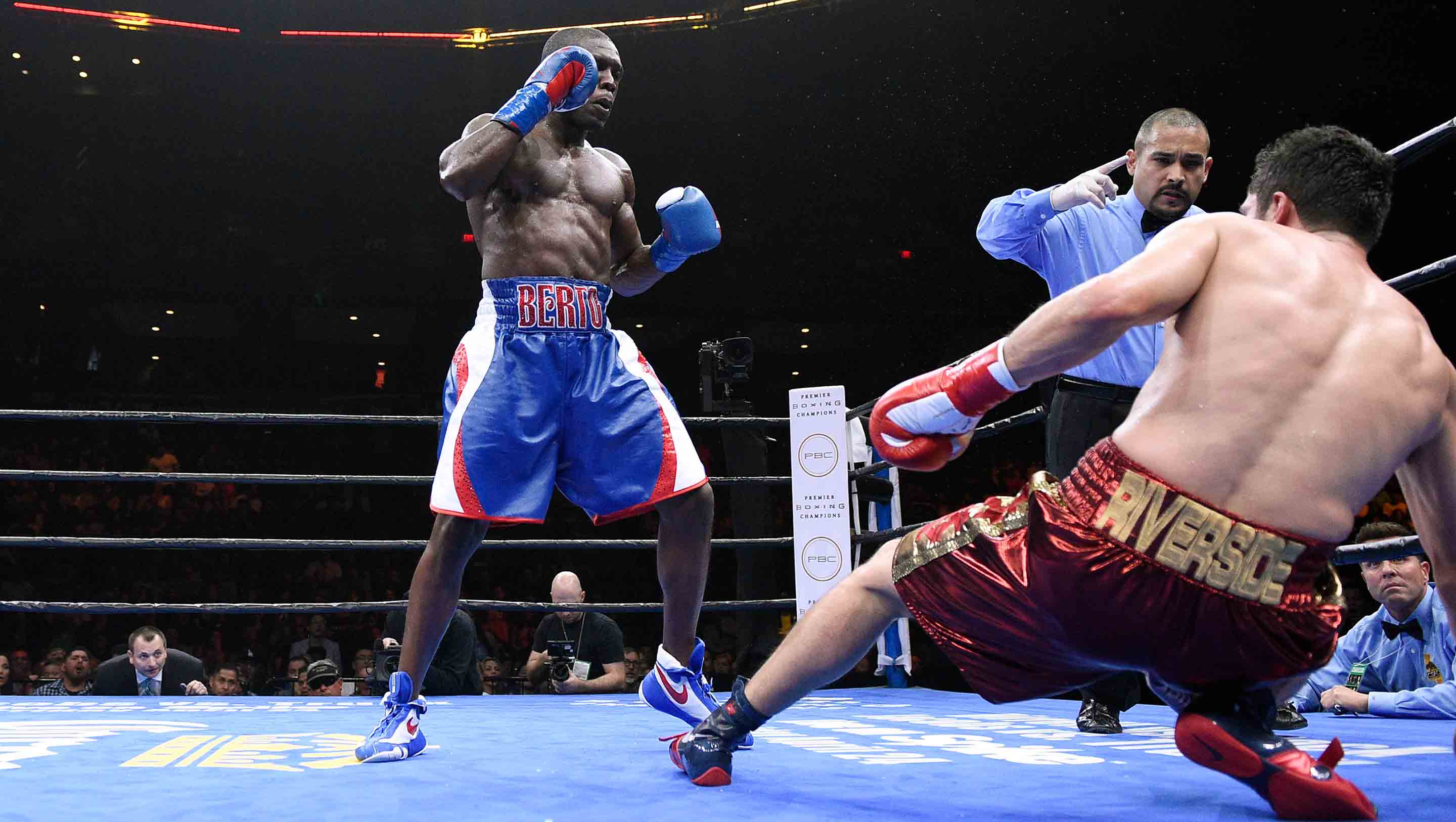 Berto knocks down Lopez
