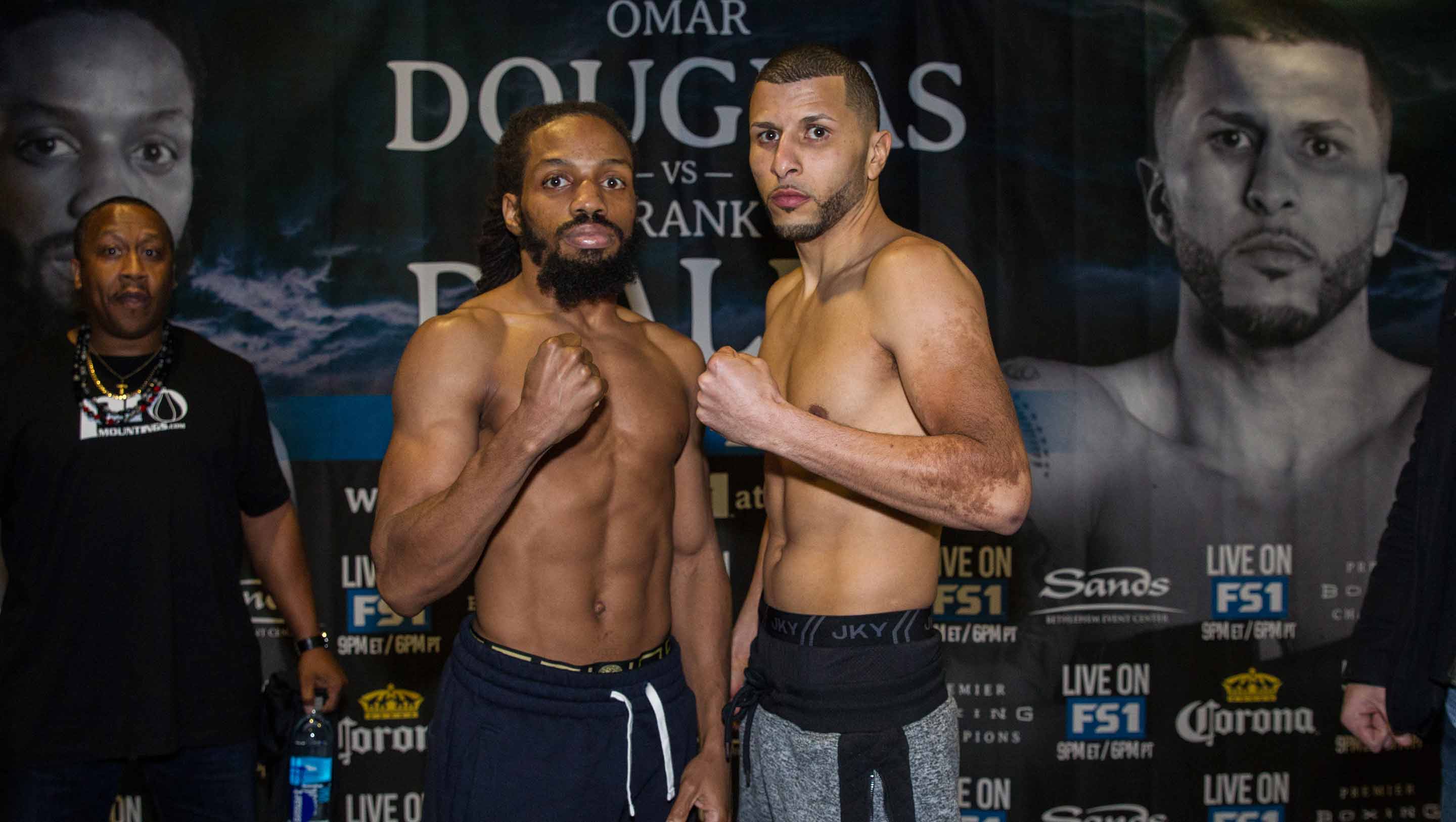 Douglas and De Alba meet at weigh-in