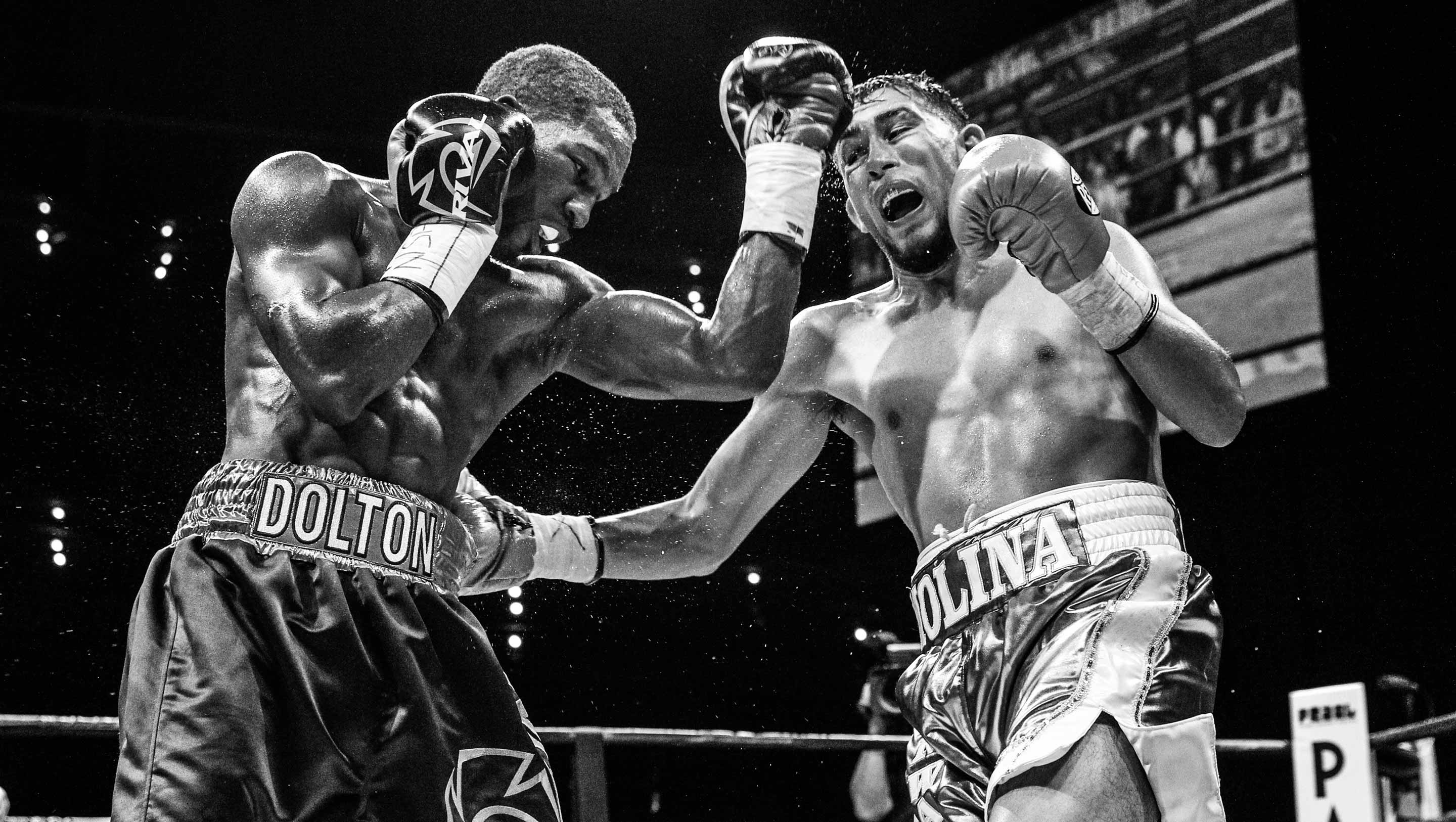 Molina lands a low right