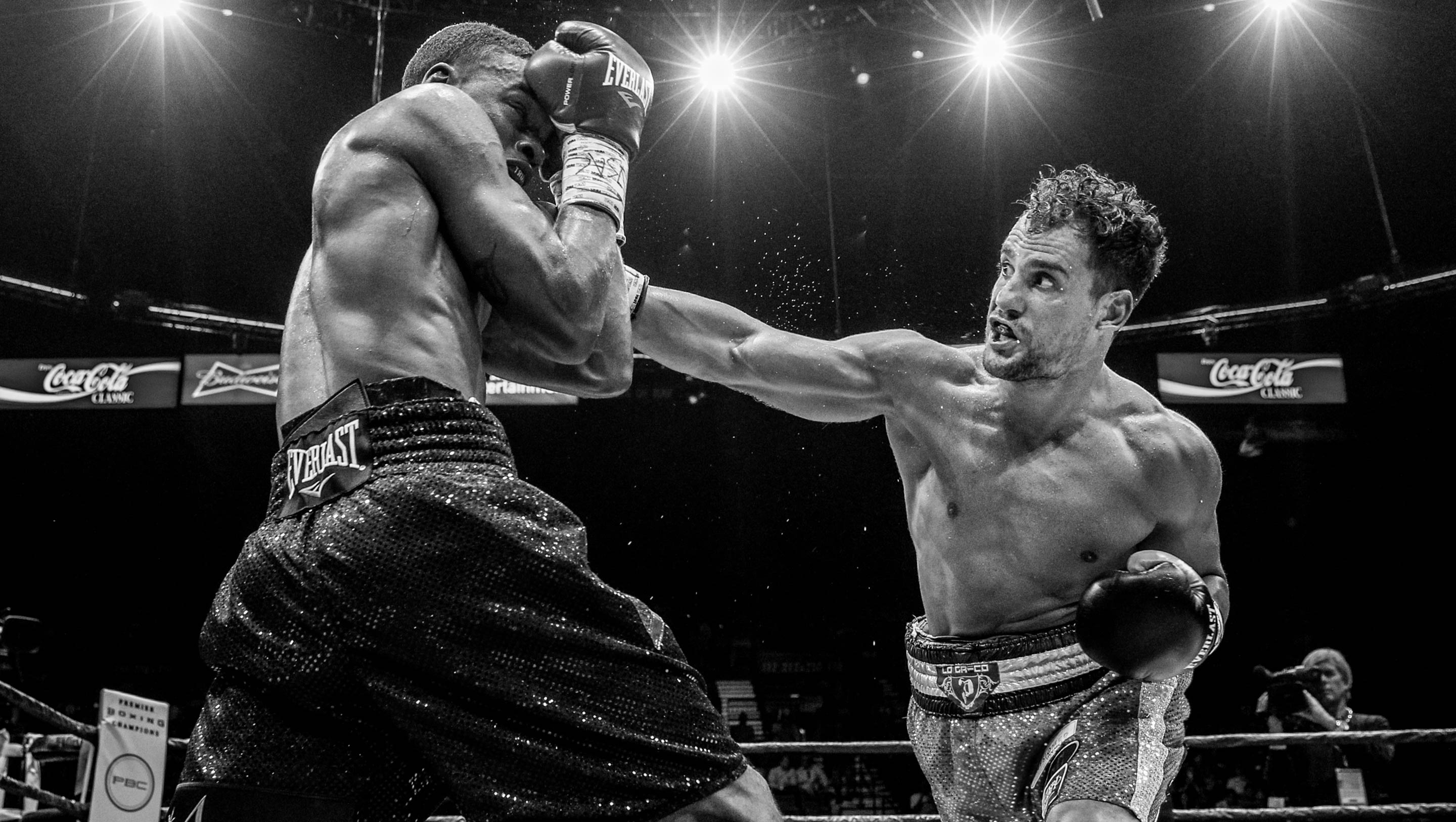 Lo Greco throws a punch