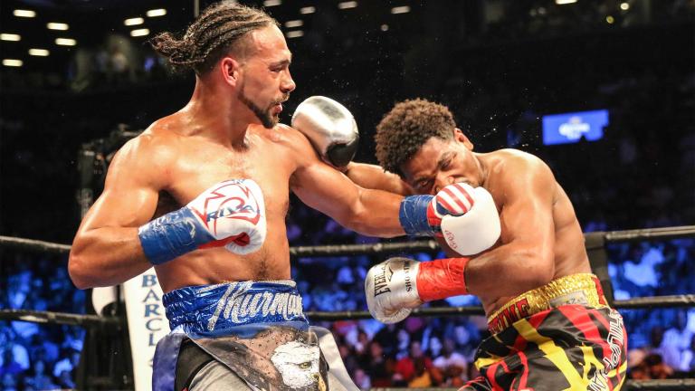 Thurman outlasts Porter, holds on to 147-pound title in fist