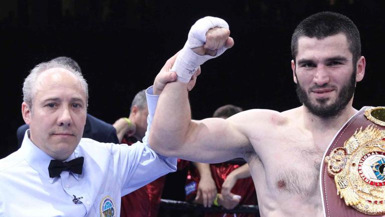 Artur Beterbiev and referee Mark Nelson