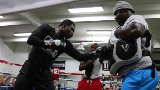 Adrien Broner and Floyd Mayweather Jr.